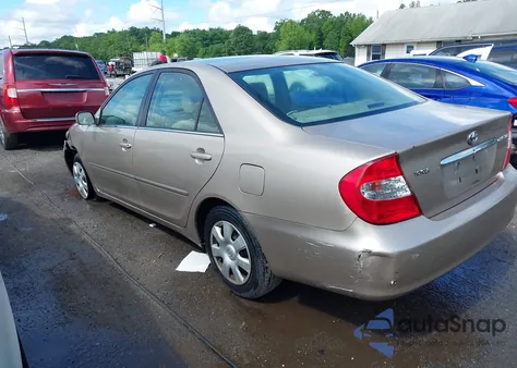 2002 Toyota Camry Le z USA, uszkodzony, nr VIN 4T1BE32K52U103917